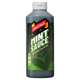 A 500ml plastic bottle of Crucials Mint Sauce with a green label and white cap—rich, fragrant, and ideal for topping lamb dishes.